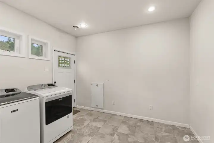 Main floor Laundry with exterior entrance.