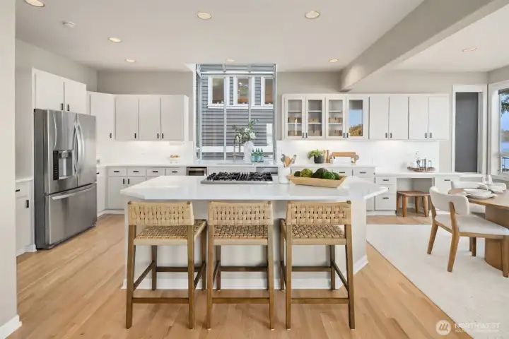 Move in ready with gorgeous white oak hardwoods and a sleek new quartz kitchen island and countertops, every space flows with light, texture and a modern PNW style.