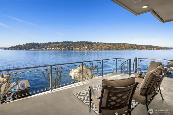 The picturesque deck overlooking the serene lake.