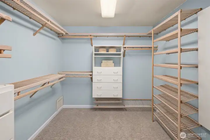 Spacious primary suite closet.