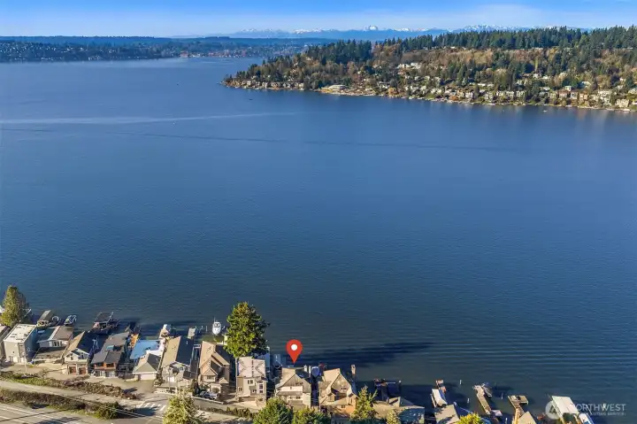 Nestled on a quiet private lane near the trail to Coulon Park, and minutes from Bellevue and Seattle, this is lakeside living without compromise.