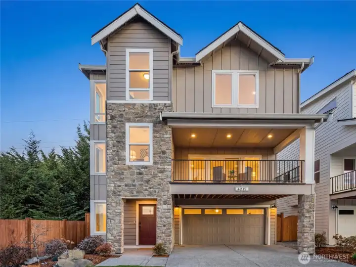 The Glacier Home Plan. All photos, renderings, site maps, and floorplans are for visualization purposes only. Plans, colors, building orientation, finishes, home outlook, and other details can and WILL vary. Striking three-level Glacier plan showcases a modern Craftsman façade with brick accents, vertical siding, and oversized windows for maximum natural light. Covered balcony and welcoming entry set the tone for refined living in Bothell’s Foxmoore community, close to Canyon Park conveniences and I-405 access.