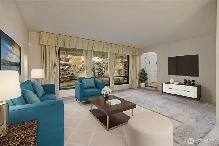 Same living area looking back towards front door with oversized front windows - Virtually staged