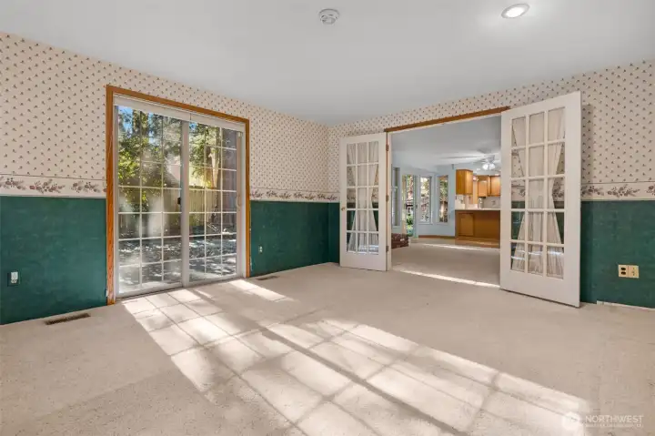 Incredible room!  Home office or rec room - TONS of light and slider to patio - Not staged