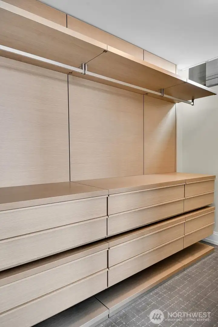 Walk-in closet in the primary bedroom.