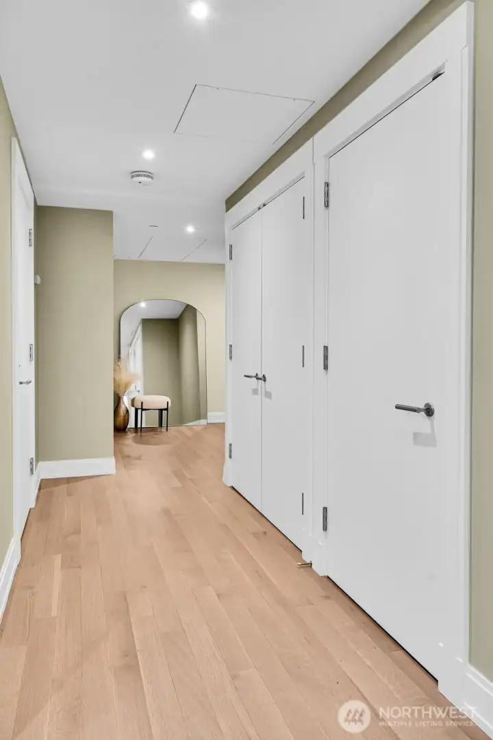 Large storage closets are located near the entry of this residence.