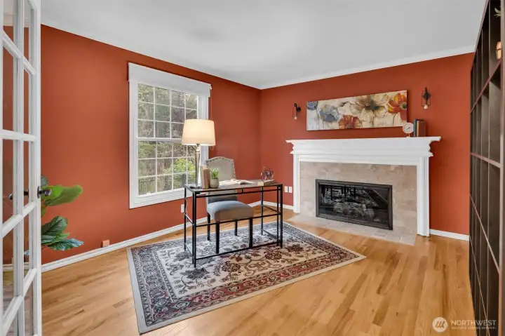 Cozy office/den with gas fireplace off the entry