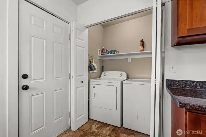 Convenient In-Home Laundry Closet with Full-Size Washer and Dryer