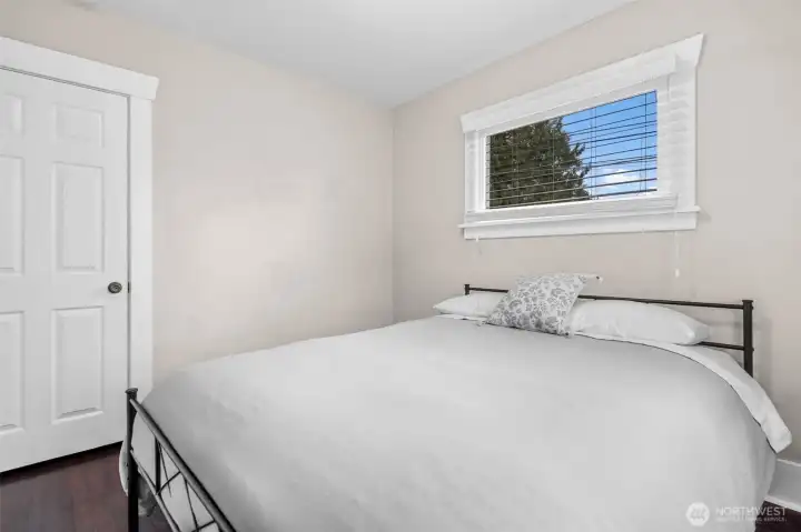 Cozy Bedroom with Hardwood Floors and Ample Closet Space