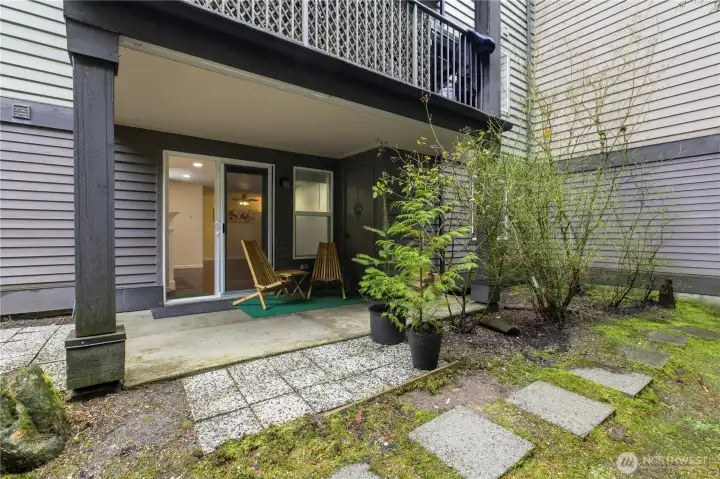 Ground floor unit with private patio--soon to be surrounded by blooming greenery