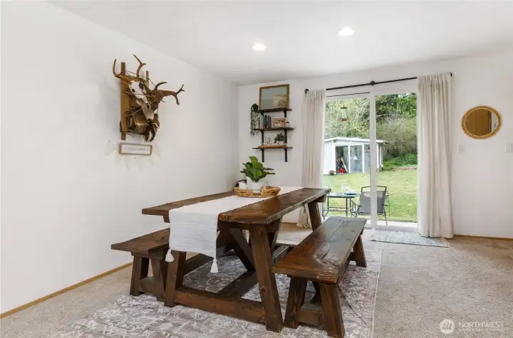 DIning room is situated perfectly between the living room and kitchen.  access to back patio.