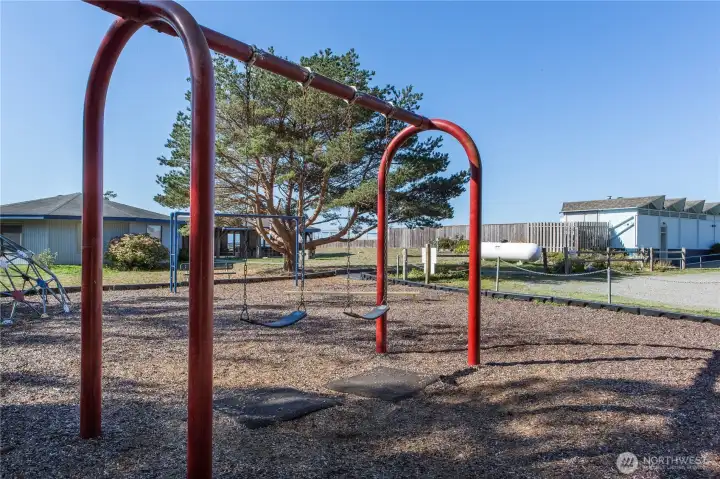 The playground has monkey bars, swings slide and huge play set so you can pretend you are on a pirate ship or castle.
