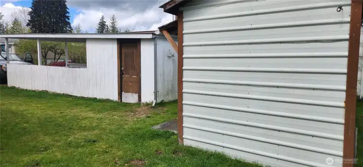 Carport with attached shed and the 2nd detached shed/workshop