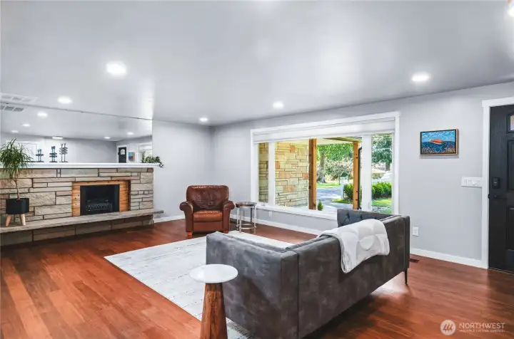 Main front room. Open layout from kitchen.