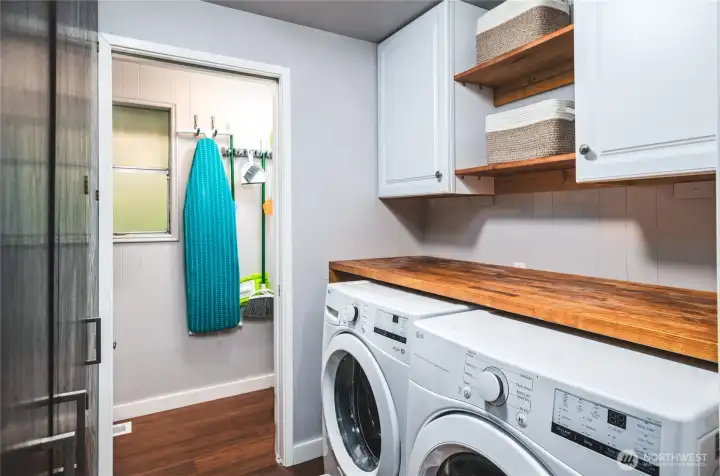 Utility room with bathroom.