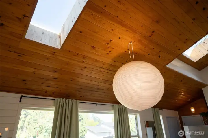 More light and playful knotty wood provide a wonderfully unique interior ambiance.