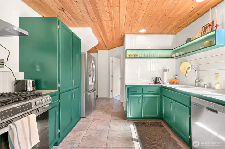 Fresh appliances join a lively kitchen.