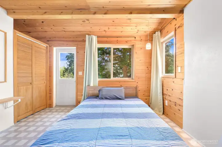 Main floor bedroom has its own private deck