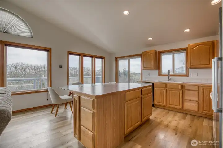 Kitchen has plenty of storage and an island eating space.