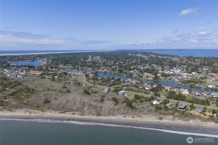 To the west, you see Oyhut Bay Seaside Resort, Lake Minard, and the ocean beaches.
