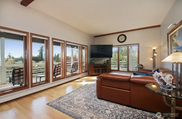 Walls of windows capturing the Sound & your private sanctuary