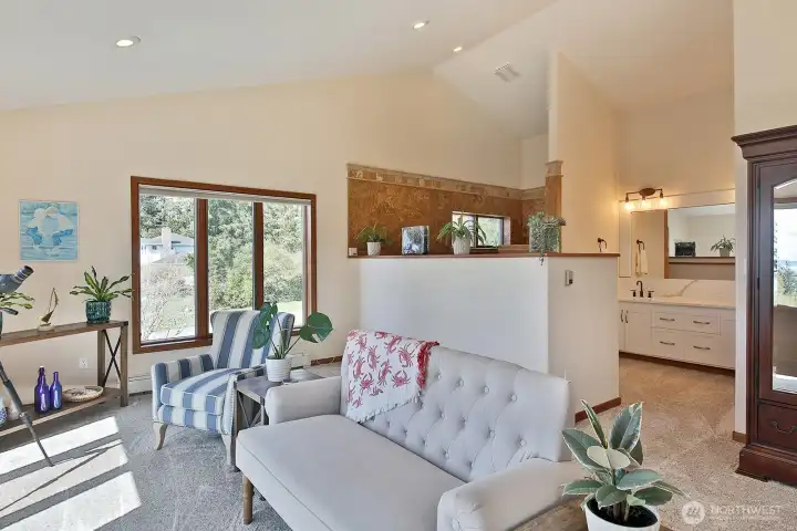 Primary Bath w/ walk in shower behind sitting room