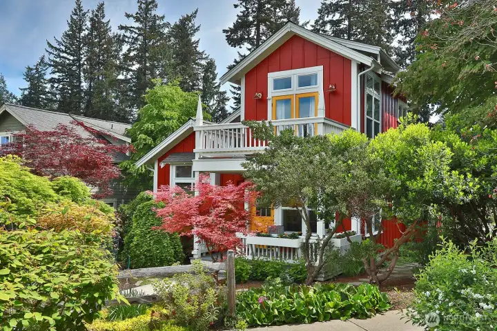 Lush and colorful landscaping adds natural privacy and serenity.