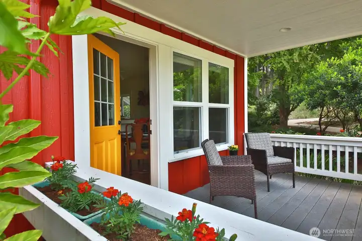 The covered back porch invites year-round outdoor enjoyment, protecting you from the elements.
