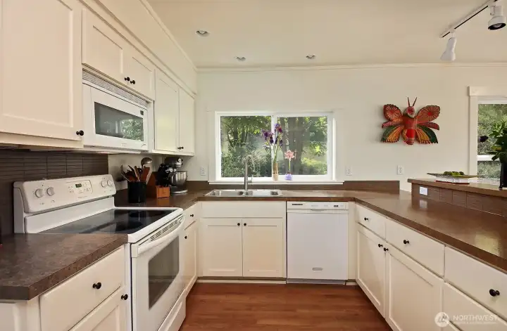 Enjoy preparing meals surrounded by garden views and natural light.