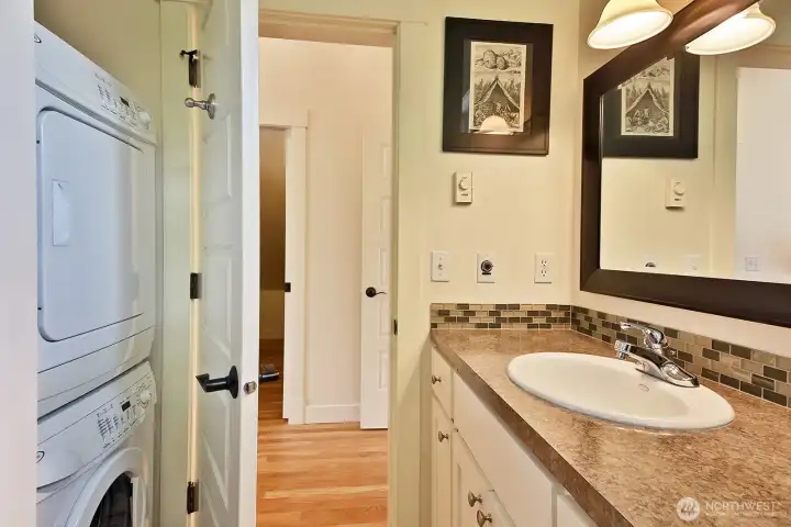 Bath and laundry area on the upper level.