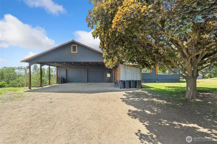 Oversized attached garage/shop with additional covered parking Oversized attached garage/shop with additional covered parking