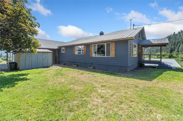 Metal roof and well maintained home.