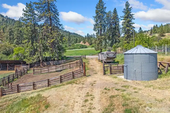 Multiple Paddocks, grain silo converted to feed and supply storage.