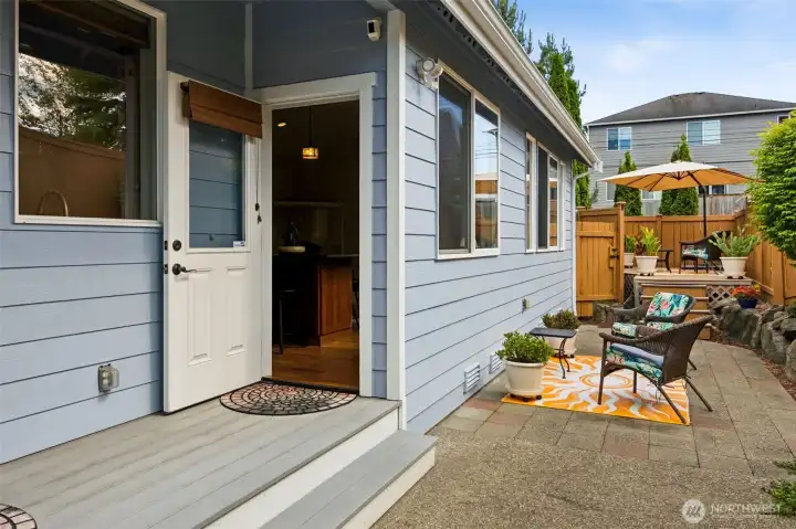 Back door leads out to the private backyard and is perfect just off the kitchen for quick access to the BBQ.