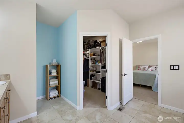 Primary suite with walk-in closet.