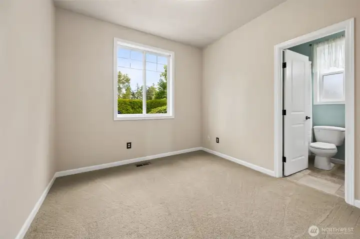 Bedroom #2 (jr. primary suite) has a full Jack & Jill bathroom attached.