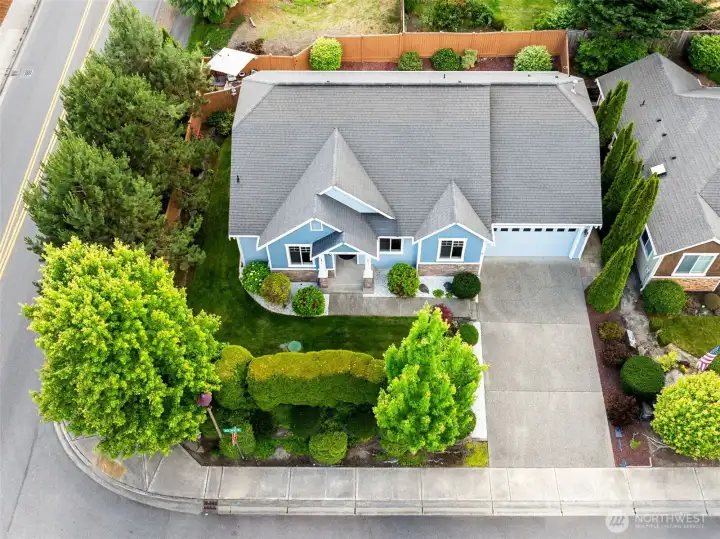 Meticulous home with very low maintenance lawn care.