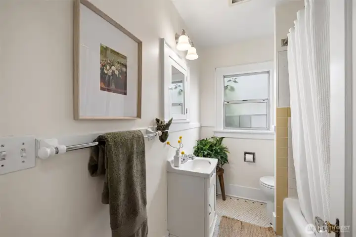 Main floor bathroom with tub