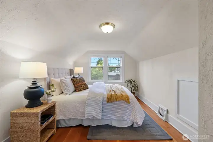 Upper floor bedroom bright and sunny