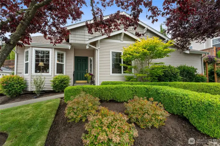 Mature landscaping adding great color in the community.  RARE STAND ALONE HOME (no attached walls with other units).