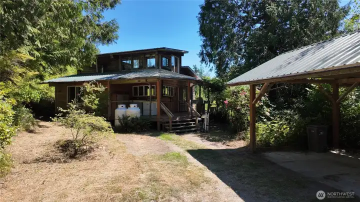 This off grid cabin uses solar power and propane gernerate as back up. Power is at driveway. This off grid cabin uses solar power and propane gernerate as back up. Power is at driveway.