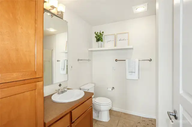 2nd bathroom with a shower adjacent to the 2nd bedroom