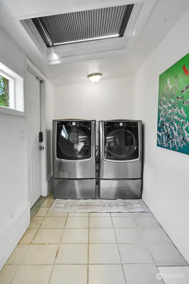 Laundry/mudroom is simple and efficient.