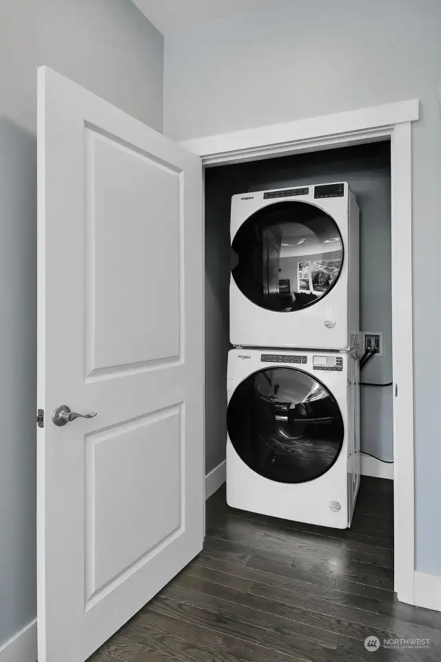 Stackable washer/dryer is discretely tucked away in laundry closet. No details have been overlooked; this amazing property is waiting for you.
