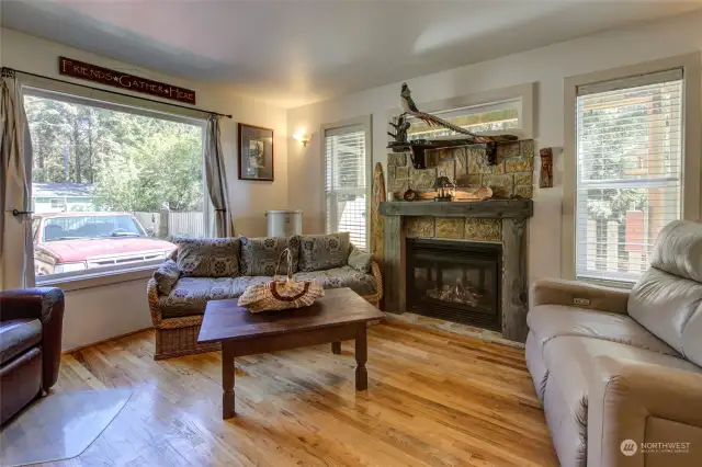 And...the cozy living room with that stunning, lodge-style fireplace!