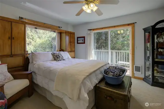 Bedroom is spacious, with private access to the upper deck.