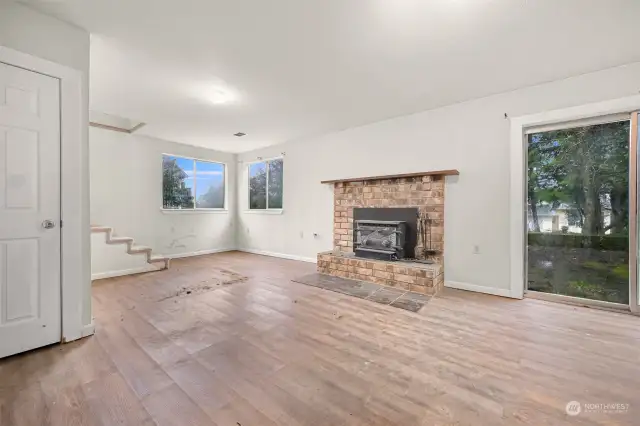 Downstairs bonus room leads out through double doors to patio.