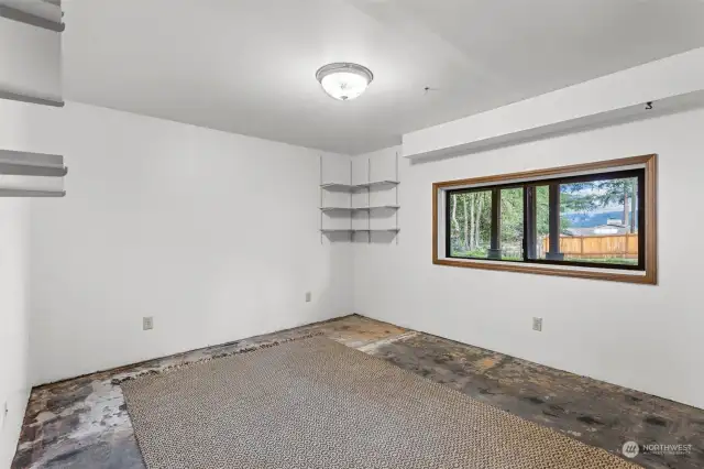 3rd bedroom just painted. Natural light  and bright facing water