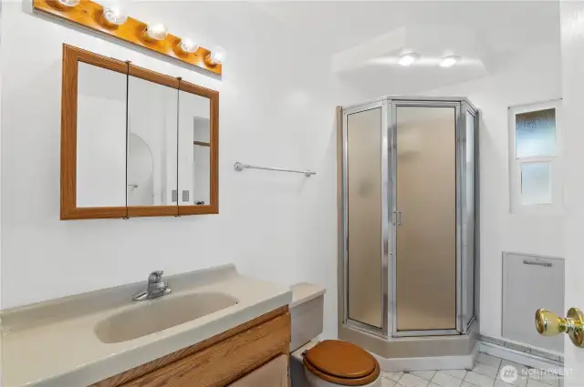 Downstairs bathroom/laundry room.