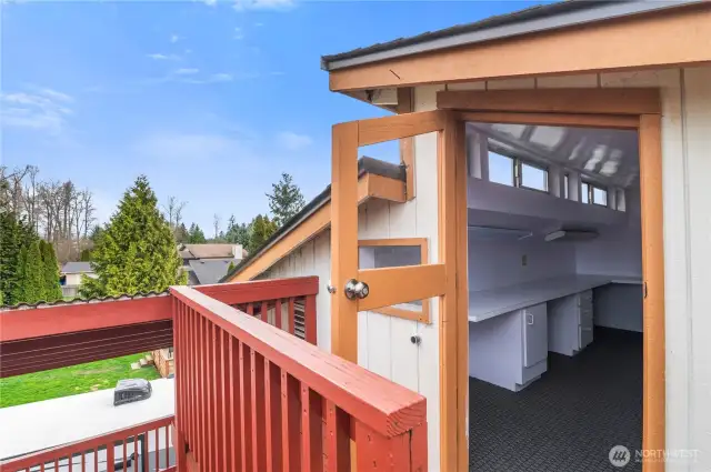 Don't miss the upper level hobby room with exterior door!